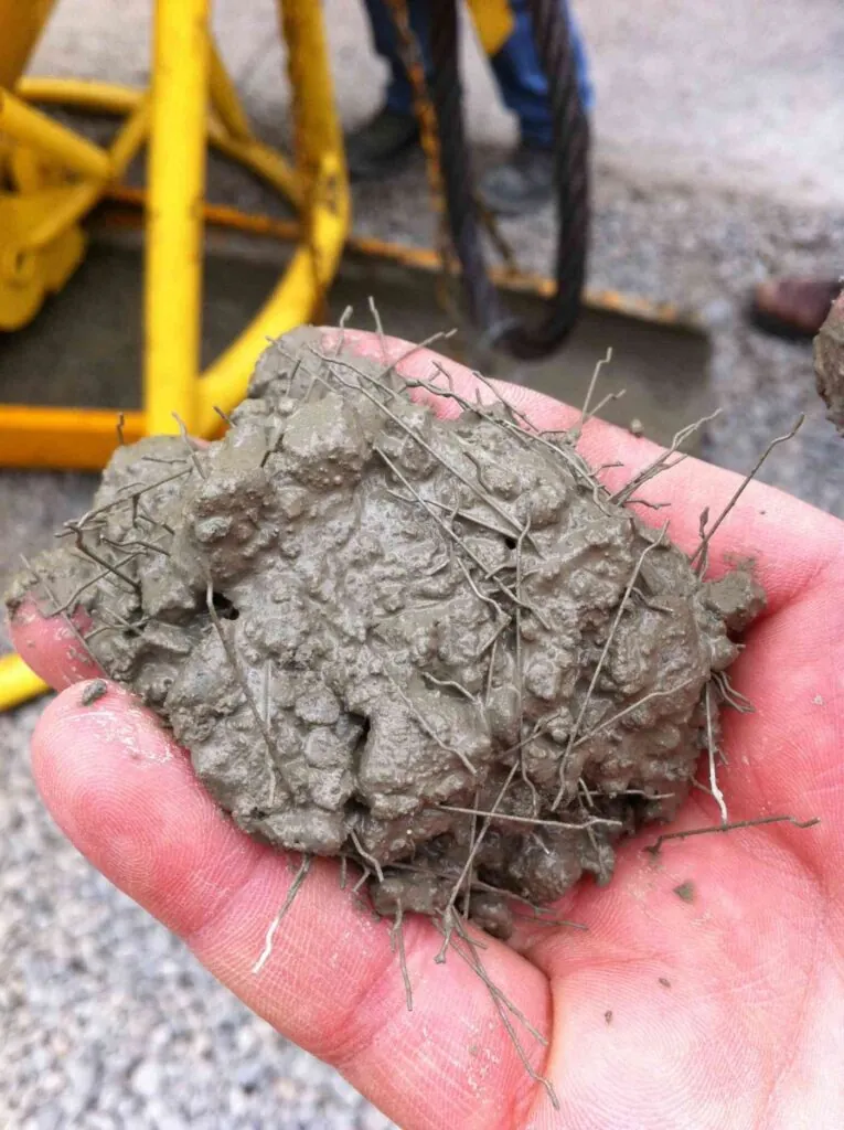 close up view of steel fiber mixed on concrete