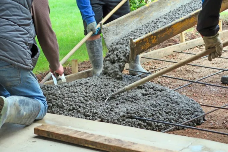 Concrete driveway installation process with poured concrete